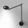 Adjustable Anthracite Grey Demetra LED wall light with motion sensor by Artemide, ideal for modern bedrooms and workspaces