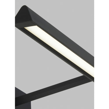 Dessau 18 inch wall mounted picture light, Nightshade Black, showing detail of LED illumination on canvas art.
