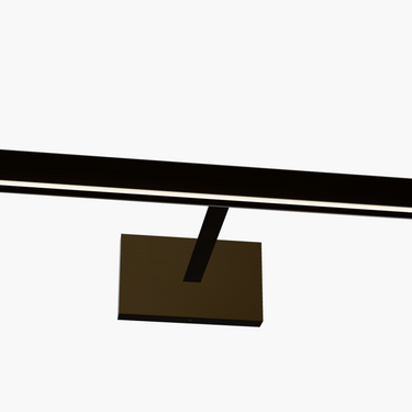 Dark Bronze Dessau 18" LED picture light, illuminating artwork with 3000K warm white light.