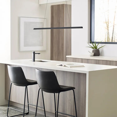 Dimmable Nightshade Black integrated LED linear suspension light by Sean Lavin - in a Kitchen Island