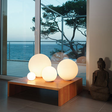 Elegant Dioscuri Globe Lamp by Artemide, ideal for hotel lobbies and contemporary homes