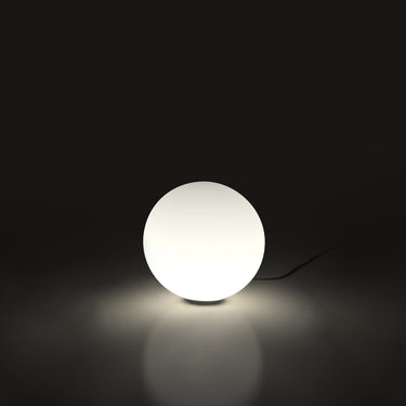 Dioscuri Table Lamp by Artemide, hand-blown glass globe light for modern residential interiors