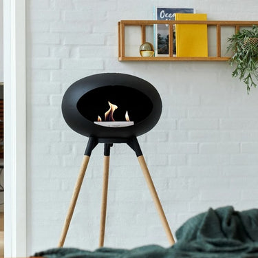 Sleek Le Feu Dome Black Ground Steel High Fireplace in minimalist interior