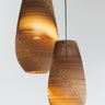 Natural Drop pendants hung together in a cluster of staggered lengths, Graypants Scraplights