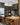 Black anodized Dyna 8-foot linear suspension, acrylic prismatic lens, direct down lighting, kitchen island slim pendant light.
