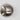 ET2 Wink wall sconce, Satin Nickel, angled unlit view of the half-dome on a pale wall