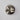 ET2 Wink wall sconce, Satin Nickel, small unlit dome on a pale wall
