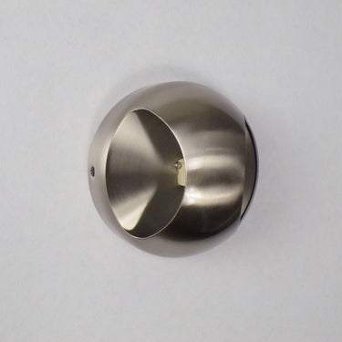 ET2 Wink wall sconce, Satin Nickel, small unlit dome on a pale wall