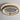 ET2 Kaia in Gray mounted flat on a light ceiling with a warm halo of light