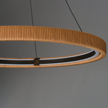 ET2 Kaia 36 in Antique Bronze ring close-up of the woven rattan wrap and LED glow