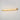 ET2 Loop wall sconce, 30 in Gold, lit with warm light on a wall