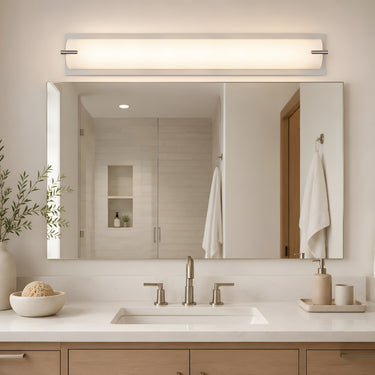 ET2 Alto bath vanity light above a bathroom mirror over a wood vanity with a single sink