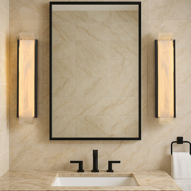 ET2 Celine white spiral glass vanity lights in Black flanking a black-framed mirror above a bathroom vanity with marble-look walls