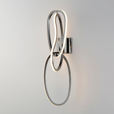 ET2 Unity wall sconce, Black Chrome, lit with glowing LED loop on a grey wall