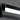 ET2 Waterfall bath vanity light, Black, close-up of the end cap and frosted diffuser