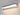 ET2 Waterfall bath vanity light, Polished Chrome, lit with warm light on the wall