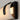 ET2 Clutch curved opal glass bath vanity light, 13 in Black, lit close-up of the end cap