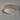 ET2 Matera 18 in Chalk White concrete flush mount, angled view of the speckled concrete ring and frosted white glass dome