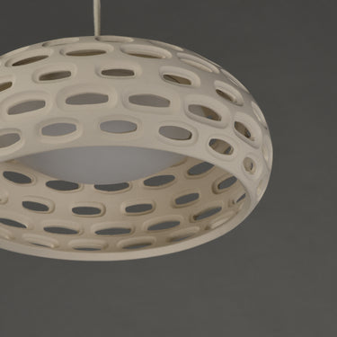 ET2 Cambria Small plaster pendant close-up from below showing the oval cutouts and white glass diffuser