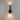 ET2 Reveal Outdoor banded tube wall sconce, 14 in Black, lit with light washing up and down the wall
