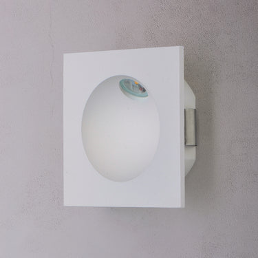 ET2 Alumilux Step Light low voltage outdoor wall light, White, angled side view on a gray wall