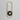 ET2 Gravity elliptical gold outdoor wall light, Large, unlit on a gray wall