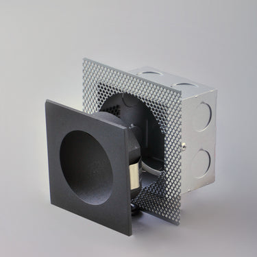ET2 Alumilux Step Light rough-in box, black square faceplate pulled out of the metal box to show the fitting