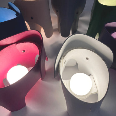 Elephant Night Lamp by EO in Purple, group of glowing elephant lamps – image 6