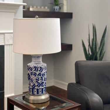 Elaine Porcelain Chinoiserie Cordless Table Lamp illuminating a modern room