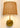 Emily Cordless Wall Sconce Antique Brass Rattan Shade in a modern living room