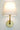 Emily Cordless Wall Sconce Antique Brass by Modern Lantern with soft lighting