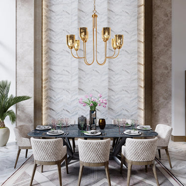 Adjustable Height Gold Chandelier hanging in a Dining Room