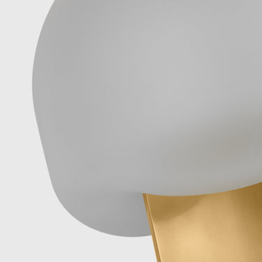 Modern accent table lamp in brass with amorphous glass shade