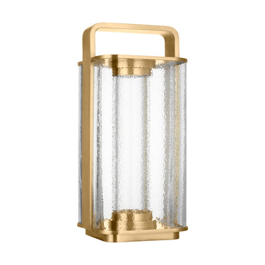 Visual Comfort Flacara lamp in antique brass with rechargeable LED for outdoor or indoor spaces
