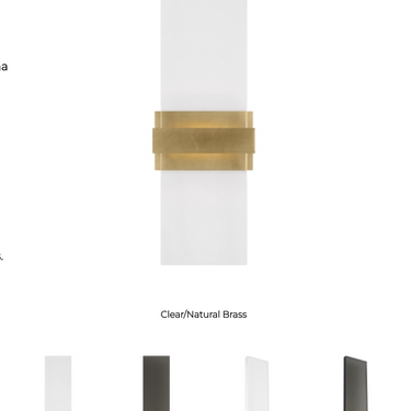 Contemporary Flyta brass and glass sconce, adding warm light to hotel corridors.