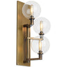 Gambit Triple Wall Sconce with clear glass globes and aged brass finish for modern residential lighting