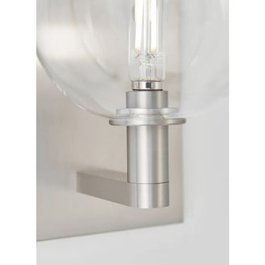 Nightshade black wall sconce with LED globe bulb and damp-rated steel hardware