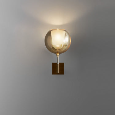 Penta Glo wall sconce with a mirrored glass sphere on the wall