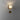 Penta Glo wall sconce with a mirrored glass sphere on the wall