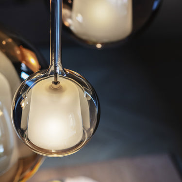 Detail of the Penta Glo Mini wall sconce handmade borosilicate glass sphere