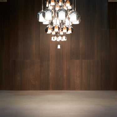 Penta Glo pendant with mirroring glass reflecting the room