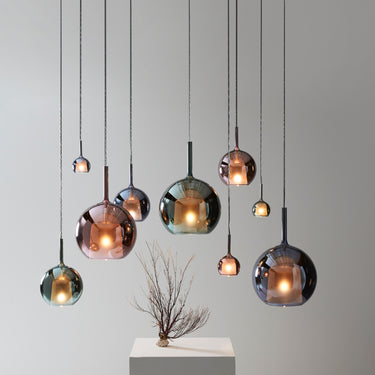 Penta Glo pendants in blue, pink and green glass