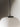 Globo Cesta pendant lamp close-up showing white glass globe and black canopy
