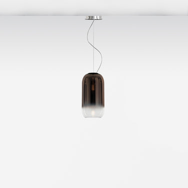 Gople Mini Pendant Light by Artemide illuminating a room