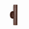 Graypants Roest industrial steel sconce installed vertically, contemporary residential hallway.