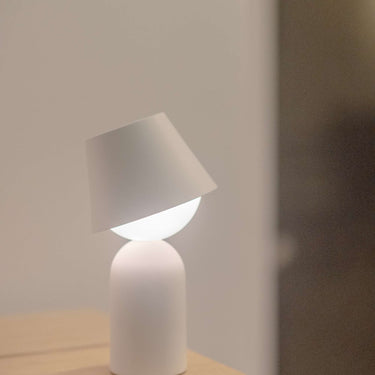 Modern portable LED table lamp with USB-C charging for indoor and outdoor use with commercial grade materials.