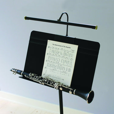 Grand Piano 19" LED Clamp Lamp in Black styled in a lived-in room – House of Troy