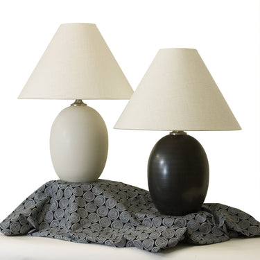 Scatchard 22.5" Stoneware Table Lamp, Style GS140 styled in a lived-in room – House of Troy
