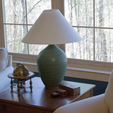 Scatchard 27" Stoneware Table Lamp, Style GS190 styled in a lived-in room – House of Troy #2