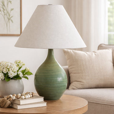 Scatchard 22.5" Stoneware Table Lamp, Style GS300 in Green Matte styled in a lived-in room – House of Troy #3